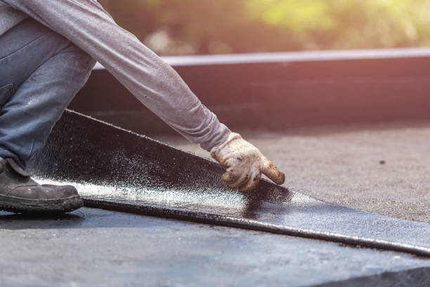 Professional Basement Waterproofing technician working in Verona, VA